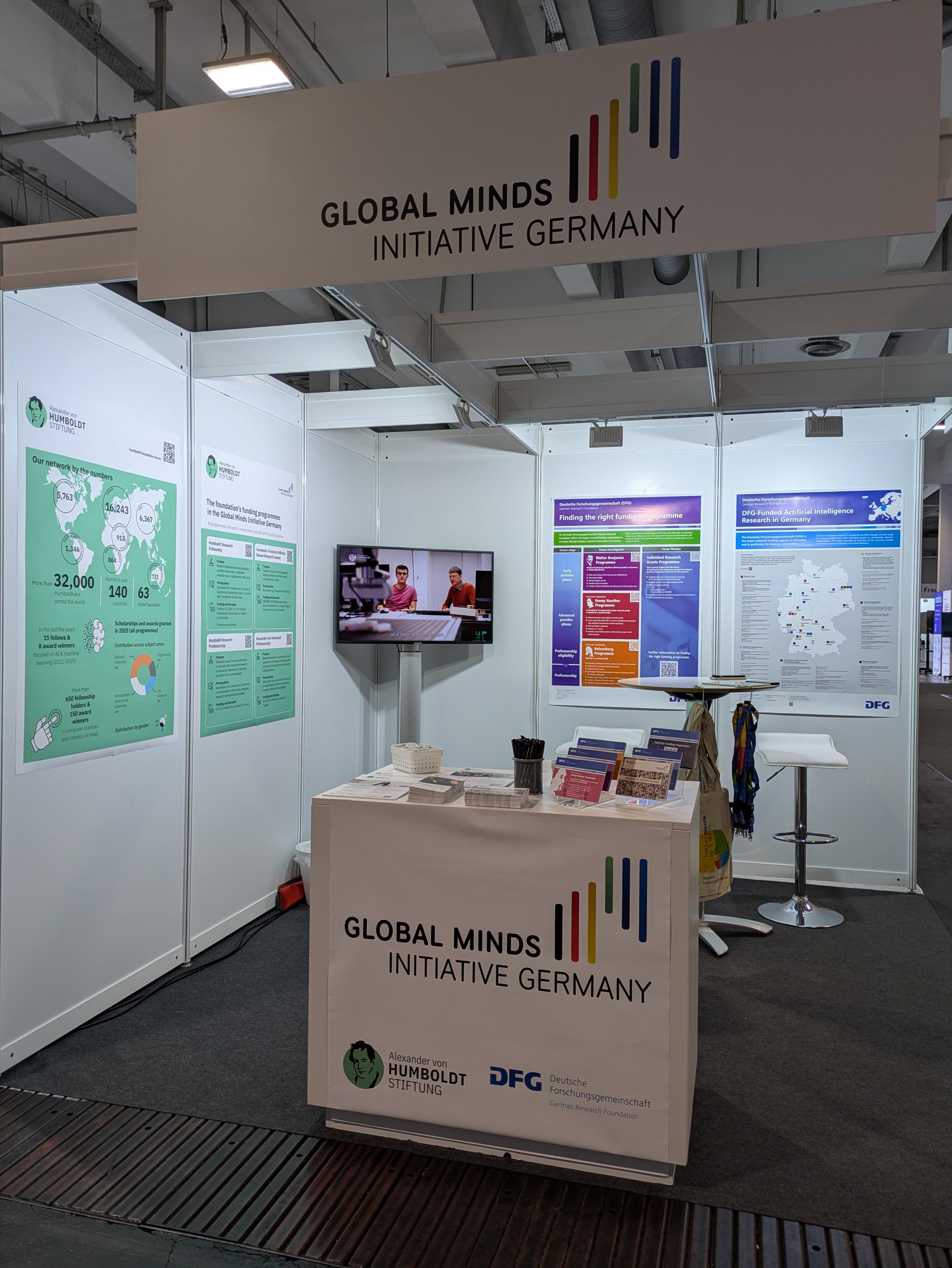 The joint booth at the IJCAI 26